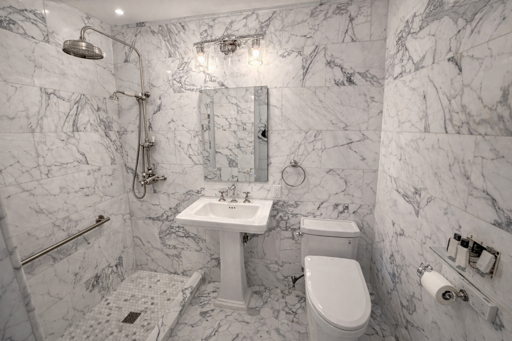 elegant marble bathroom with vintage fixtures